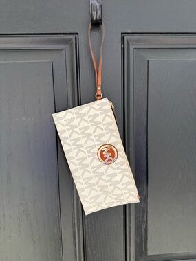 Michael Kors Cream Signature MK Wristlet with Brown Trim